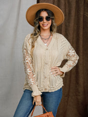 Tan knit cardigan with lace sleeves and button front