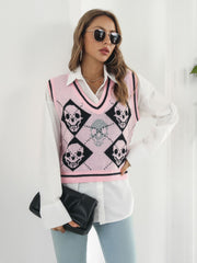 Blush pink argyle knit vest with skull motif and V-neck.