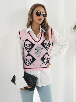 Blush pink argyle knit vest with skull motif and V-neck.