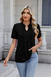 Black pleated yoke keyhole tee with short sleeves and a relaxed fit.