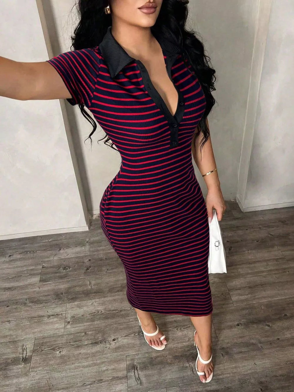 Chic striped polo midi dress in black and red with button detail and collar.