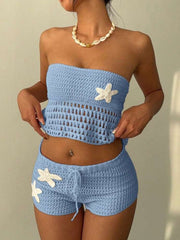 Blue crochet tube top and shorts set with starfish appliques and drawstring waist.