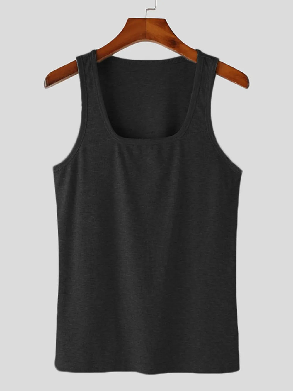 Black ribbed square neck tank top with a casual, chic style.