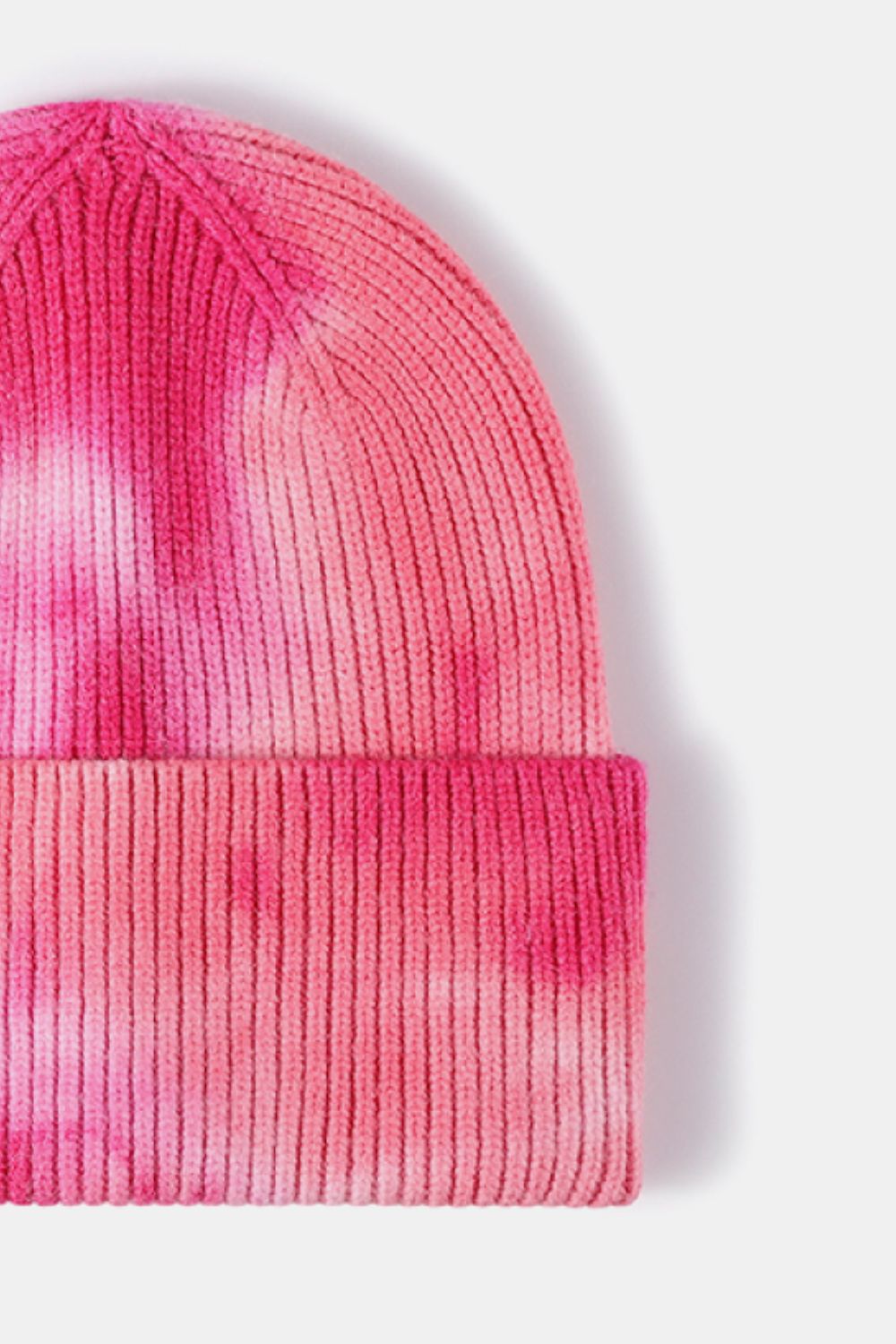 Ribbed knit beanie with pink and white tie-dye pattern