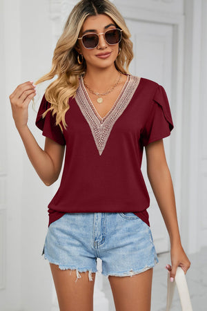 Wine v-neck flutter sleeve blouse with lace trim detail
