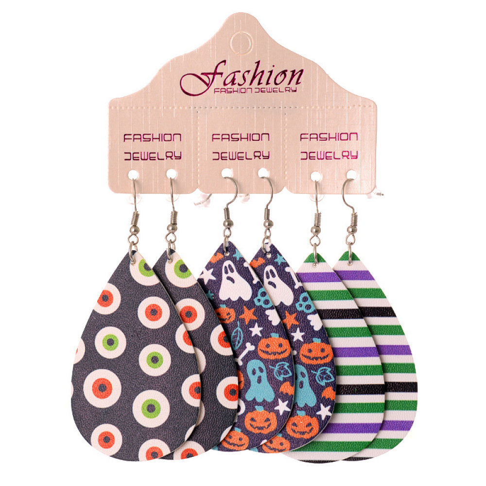 Spooky print teardrop earrings with ghosts, pumpkins, eyeballs, and stripes.