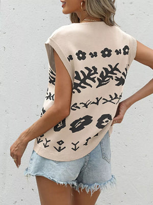 Floral-patterned V-neck cardigan vest in tan with black print, sleeveless knit style.
