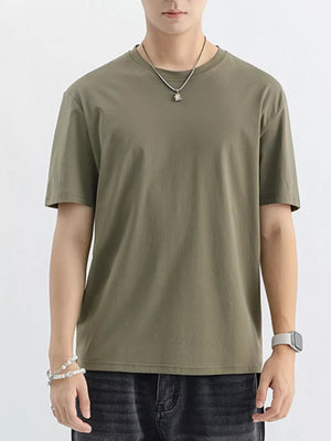 Men's green cotton crewneck t-shirt with short sleeves, a relaxed fit, and a simple design.