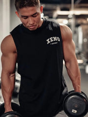 Black Xeno Tokyo graphic muscle tank top with a crew neck and sleeveless design.