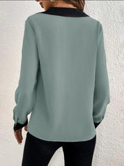Teal long sleeve blouse with contrast black collar and cuffs.