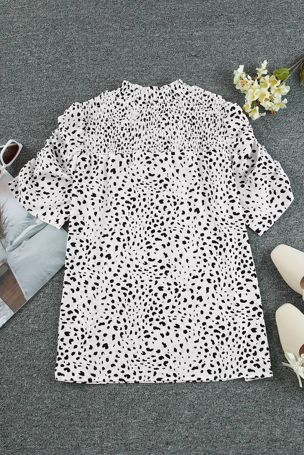 White dalmatian print blouse with shirred yoke and short sleeves
