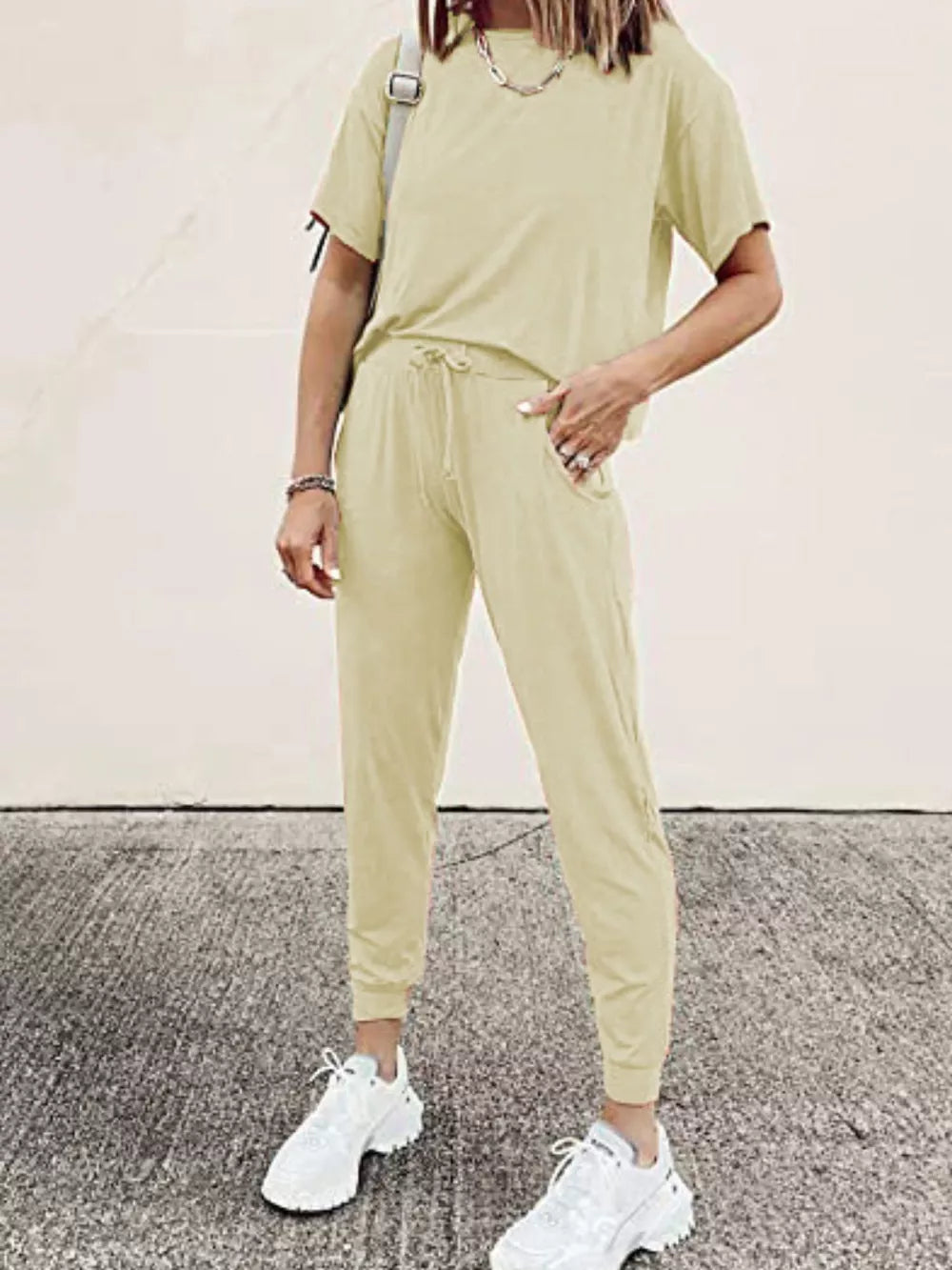 Light yellow cotton loungewear set with round neck top and drawstring jogger pants