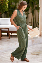Sleeveless jersey palazzo jumpsuit in matcha green with V-neck and wide legs.