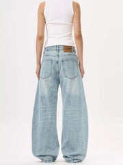 Men's light blue wide-leg stretch jeans with a classic silhouette.