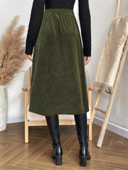 Army green corduroy A-line midi skirt with button-down front detail.