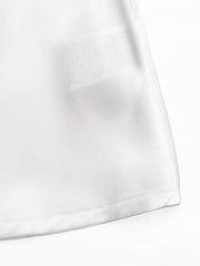 White maternity blouse with ruffled cold shoulder and tie belt detail