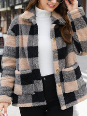 Plaid sherpa overshirt jacket in black and tan with button front and chest pockets.