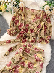Chic floral crop set with tie waist and puff sleeves in tan with pink and yellow flowers.