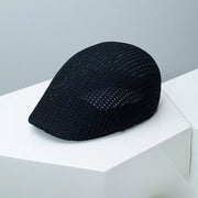 Black mesh flat cap with textured weave detail