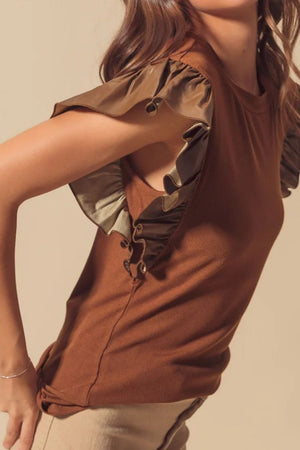 Brown ribbed top with faux leather ruffled sleeves and lace-up detail