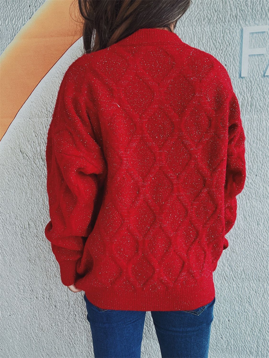 Sparkle knit relaxed fit sweater in red with diamond pattern, crew neck, and long sleeves.