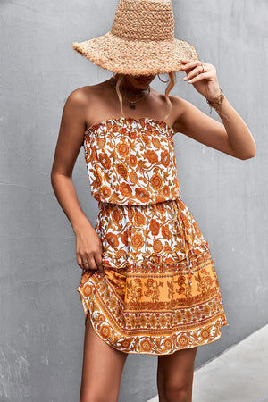 Floral print bandeau mini dress in caramel with a drawstring waist and ruffled hem.