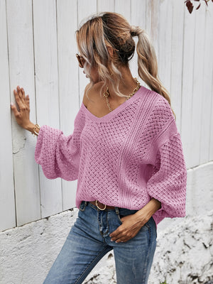 Open-knit sweater in Moonlit Mauve with balloon sleeves and V-neck.