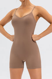 Sculpted bodysuit romper in khaki with spaghetti straps and a V-neckline.
