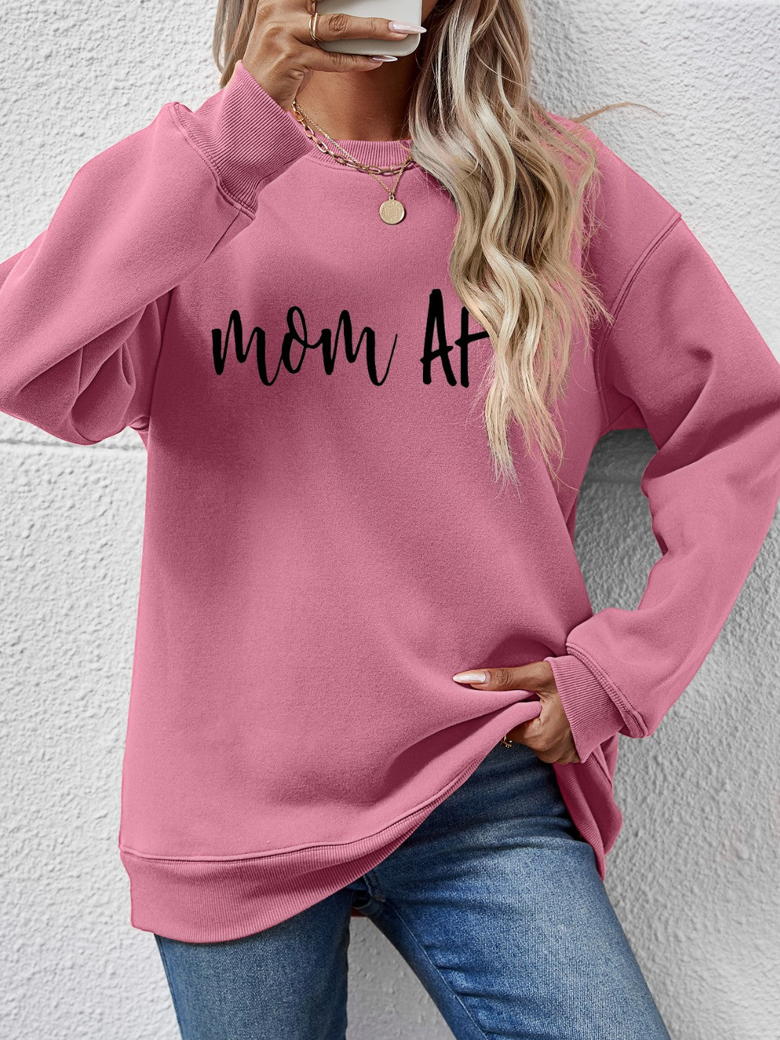 Mom At graphic sweatshirt in Blush Pink with crewneck and long sleeves.