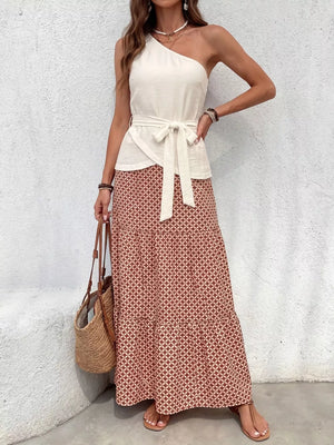 Cream one-shoulder top with tie waist and geometric print maxi skirt set