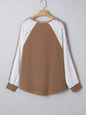 Waffle knit henley top in taupe with white lace sleeves and a subtle animal print trim.