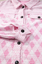 Pink diamond weave shacket with puff sleeves and buttoned front.