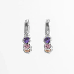 Silver dangle hoop earrings with purple, pink, and peach cubic zirconia stones.