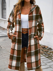 Checked plaid hooded duster coat in brown with buttoned front and pockets.