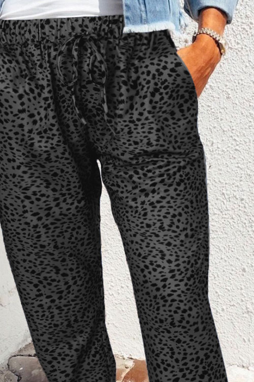 Shadow Leopard Relaxed-Fit Drawstring Trousers in Charcoal with pockets and adjustable tie waist.