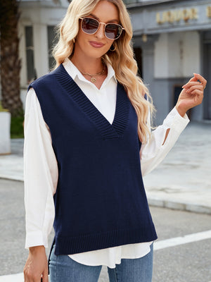 Dark Blue ribbed knit V-neck sweater vest with a relaxed fit, styled over a white shirt.