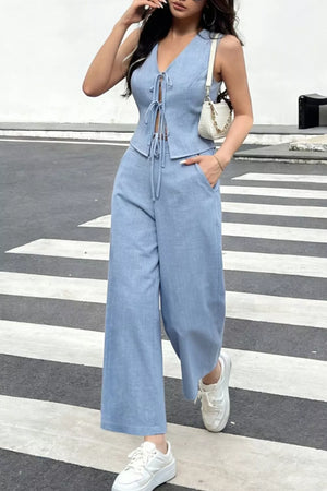 Light blue lace-up tie front crop top and wide leg pants set.