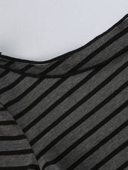 Gray and black striped t-shirt with boat neck and stretchy knit fabric.