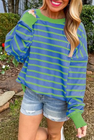 Waffle knit top with blue and green stripes, crewneck, long sleeves with contrast cuffs and lettuce trim.