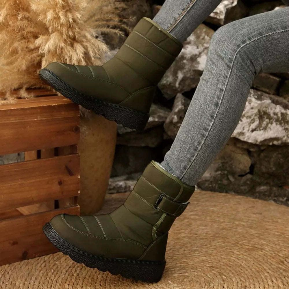 Green quilted round toe platform boots with adjustable strap and chunky sole.