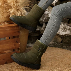 Green quilted round toe platform boots with adjustable strap and chunky sole.