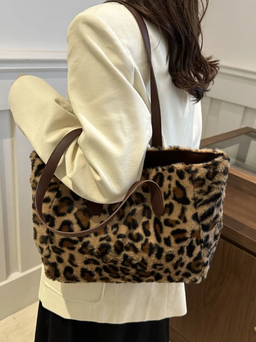 Fuzzy leopard print shopper bag with brown leather straps