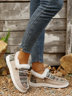 Southwestern print faux fur lined loafers in taupe with white laces and trim.