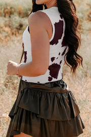Chic cow print sweater vest with crew neck and button-down front.