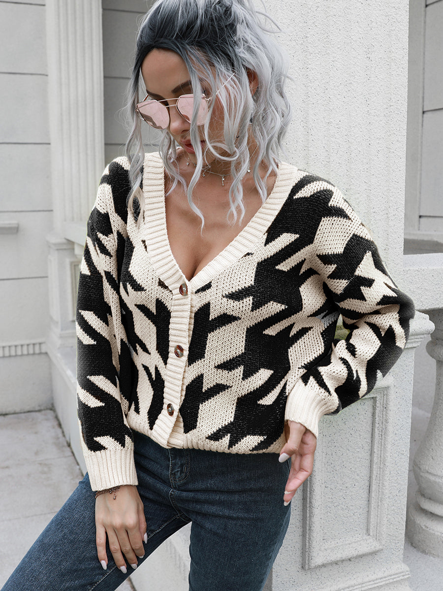 Geometric houndstooth v-neck cardigan with button front in acrylic.