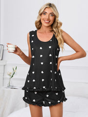 Black heart print loungewear set with ruffle hem shorts and tank top