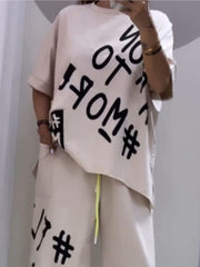 Graphic tee and drawstring pants set in Khaki with bold black graphic text print.