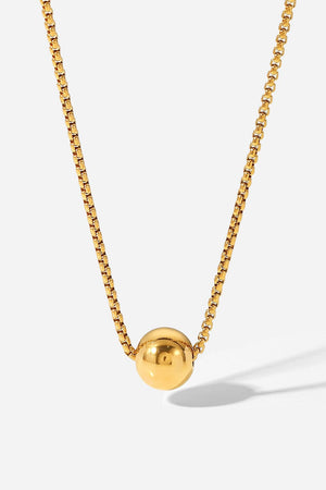 Gold orb pendant necklace with a box chain, casual women's jewelry.