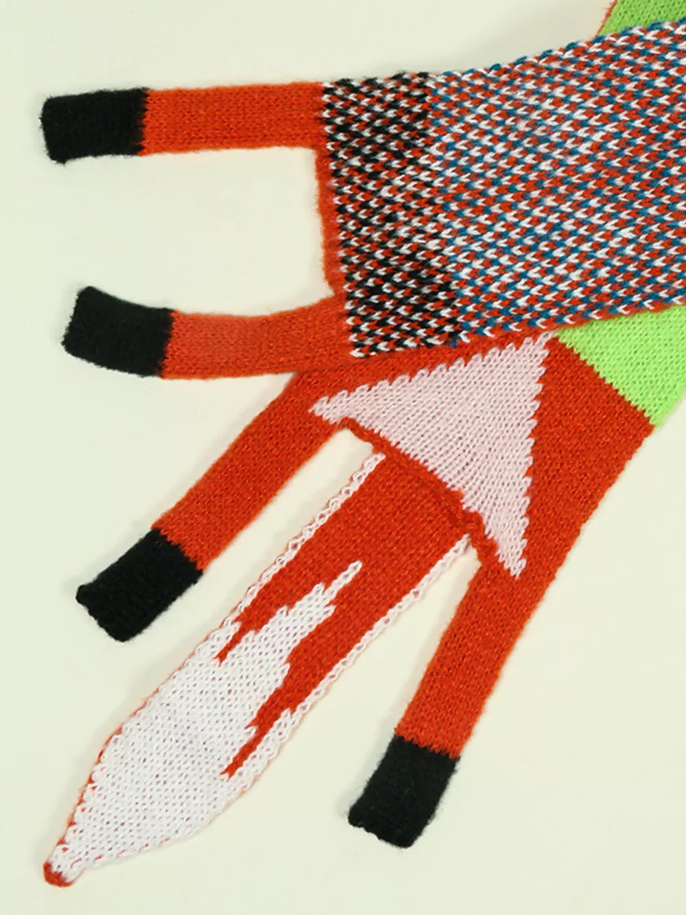 Chunky knit scarf with a fox design, featuring red, white, pink, black, and green colors.