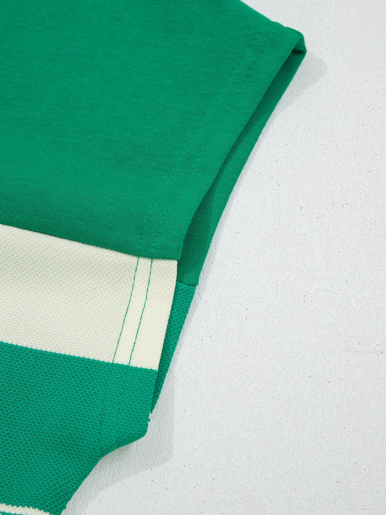 Green and white striped cap sleeve t-shirt with crew neck detail
